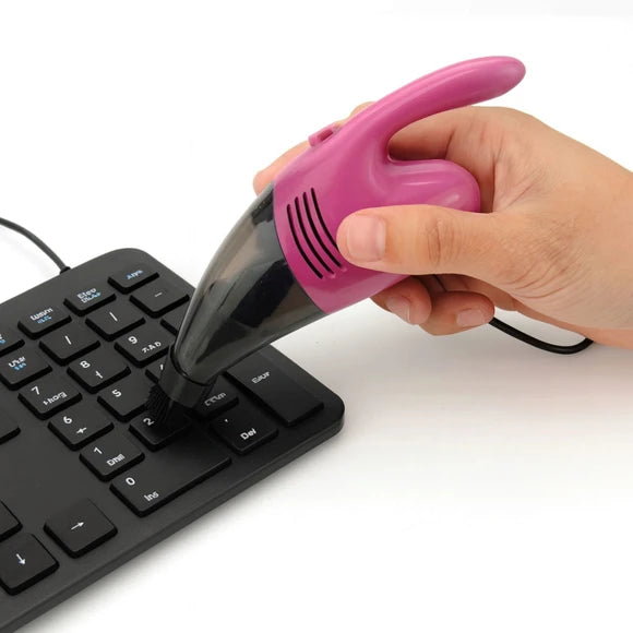 usb desk vacuum with flexible rubber attachment for tight spaces