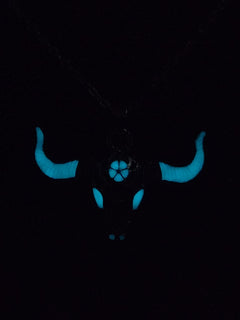Unisex buffalo skull pendant necklace with luminous stone inlay that glows after charging with light