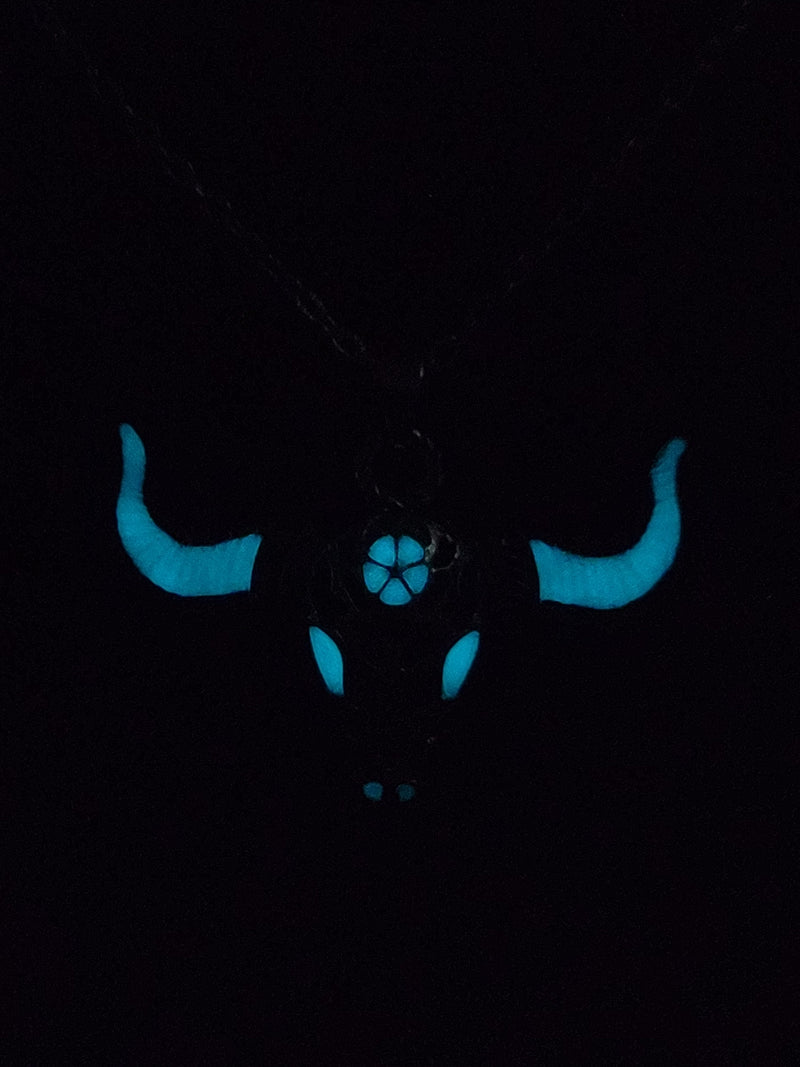 Unisex buffalo skull pendant necklace with luminous stone inlay that glows after charging with light