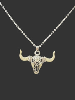 Fearless buffalo skull glow-in-the-dark silver pendant necklace symbolizing strength and perseverance
