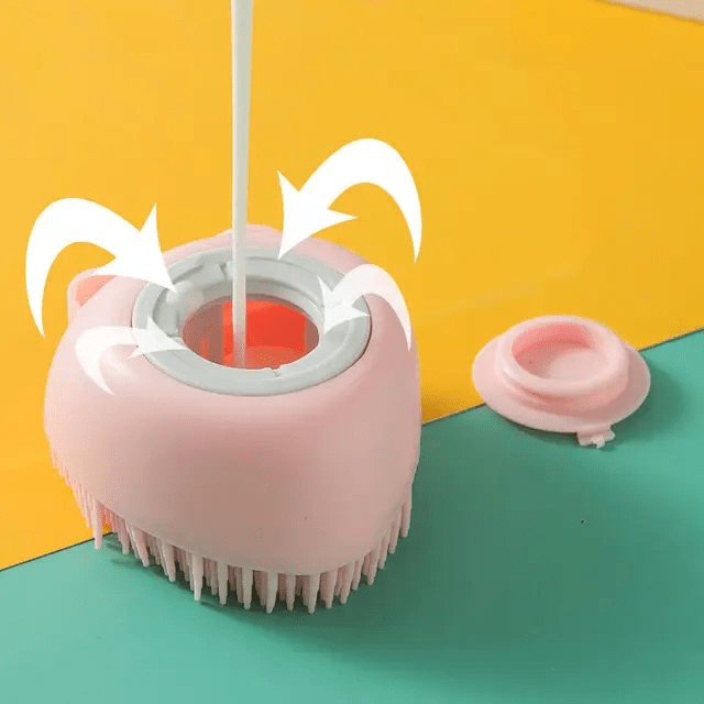 Pet shampoo brush with refillable soap reservoir and non-slip grip for easy bath time cleaning